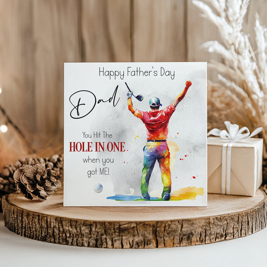 A Father's Day card with a colorful illustration of a man hitting a golf ball, along with a message that reads "Happy Father's Day Dad. You Hit The Hole In One. when you got Me!"