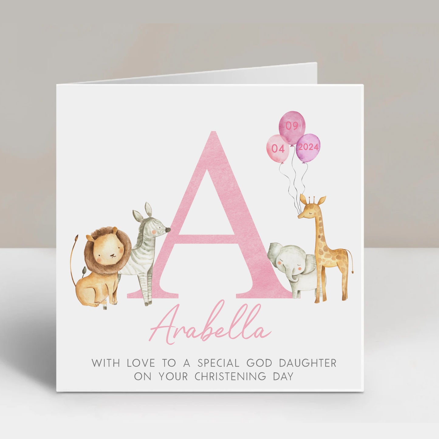 a card with a picture of a giraffe, a zebra, and a