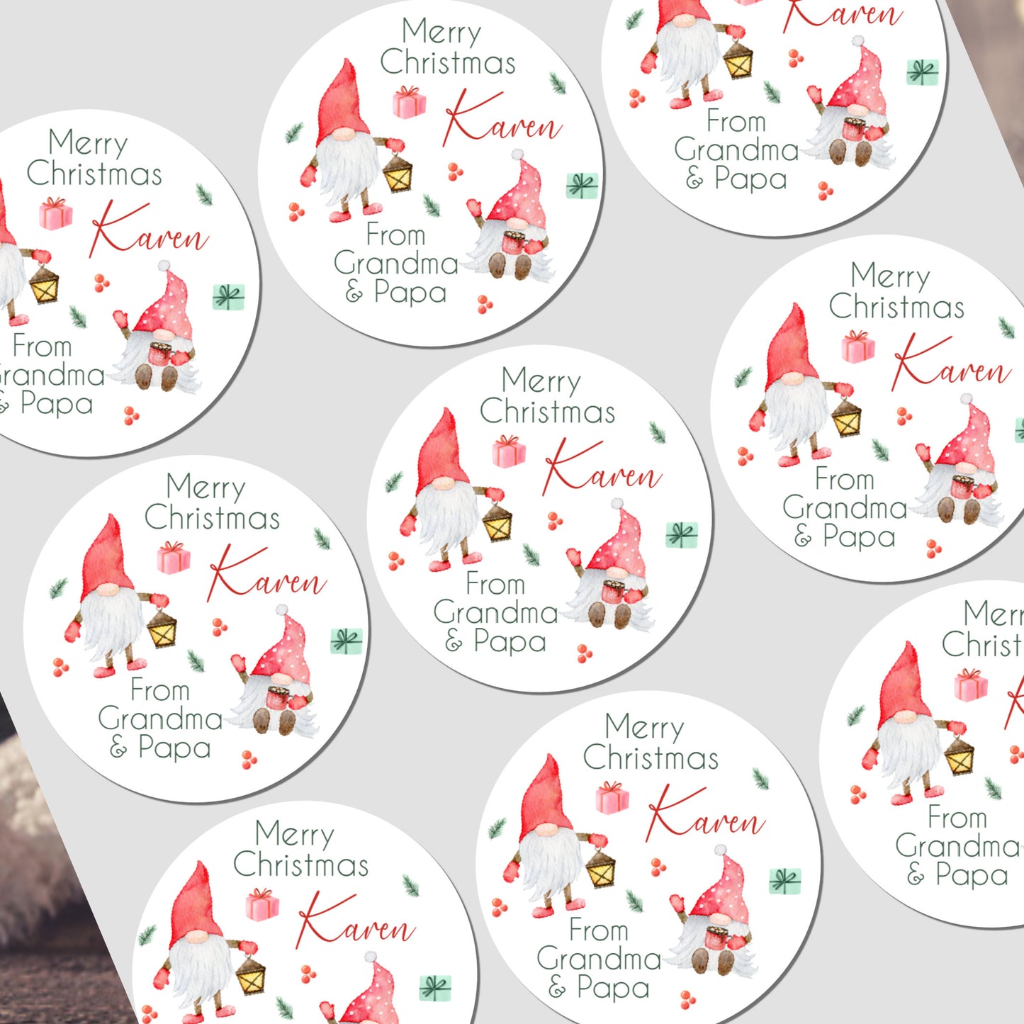 Circular Christmas stickers with gnomes and personalized text on a white background