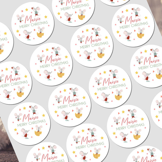 Circular Christmas stickers with cartoon reindeer and text on a white background