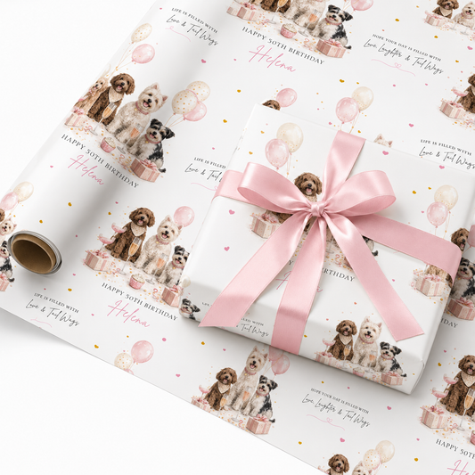 a gift wrapping paper with a repeating pattern of dogs and balloons. The wrapping paper has a pink ribbon tied around a gift box, and the text "Happy 50th Birthday Helen" is visible.