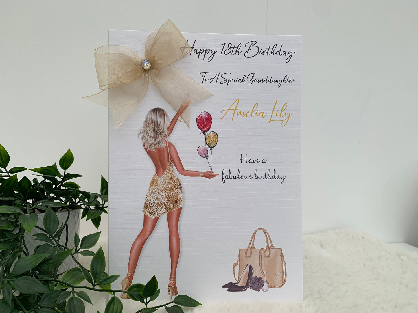 a birthday card with a picture of a woman holding balloons