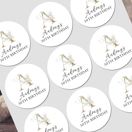 a set of twelve personalized birthday stickers