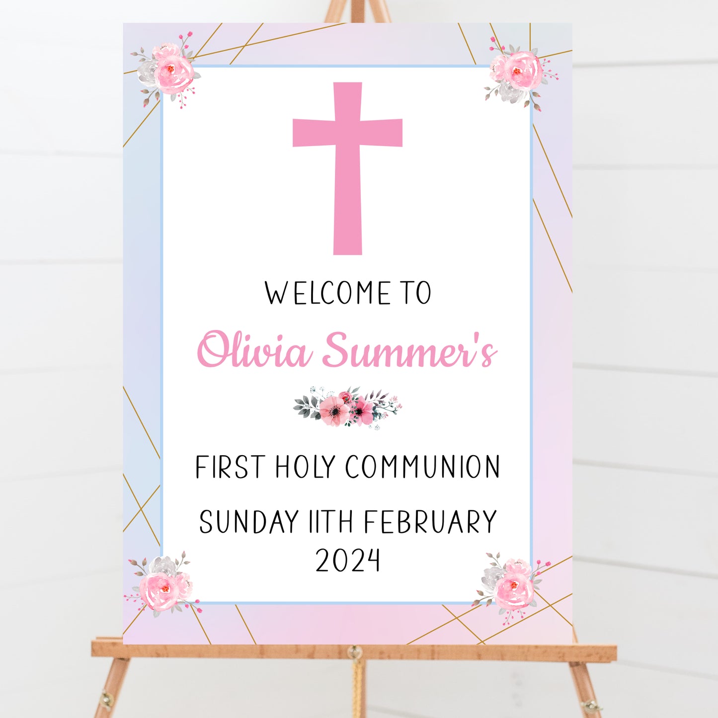 a welcome sign with a pink cross on it