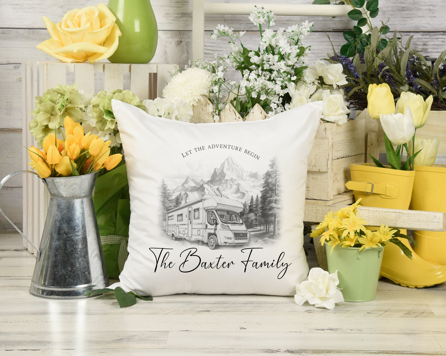 a pillow with a picture of a camper and flowers