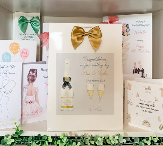 a couple of cards and a bottle of wine