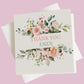 a thank card with a floral design on it