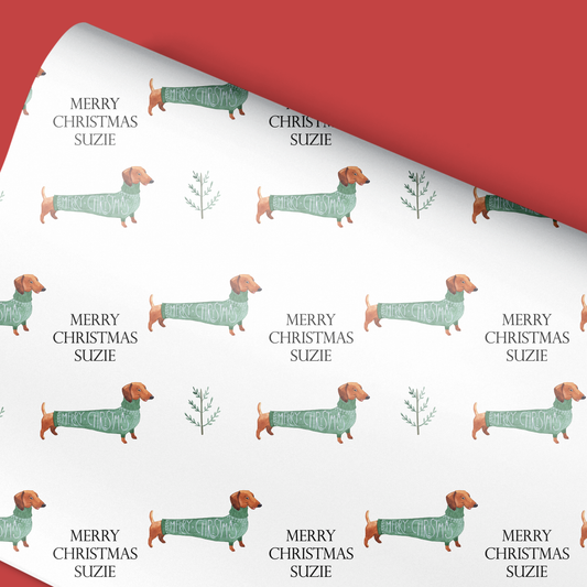 a christmas wrapping paper with a dachshund on it