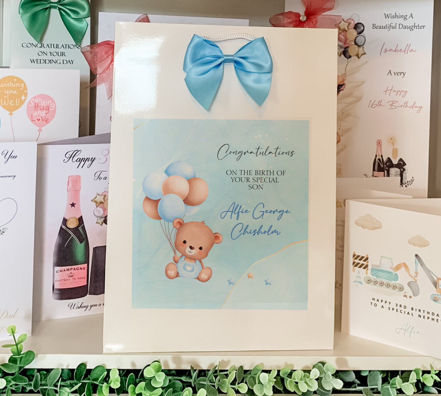 a bunch of greeting cards on a shelf