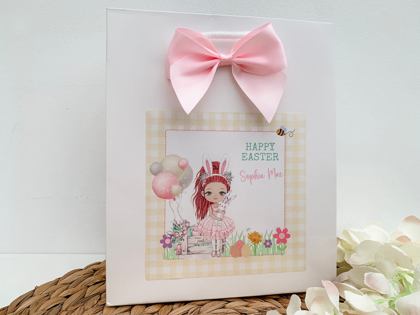 a card with a picture of a girl with a pink bow