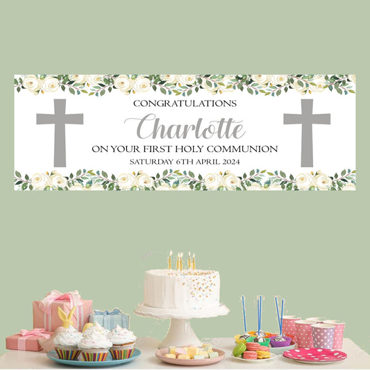 a table topped with a cake and cupcakes