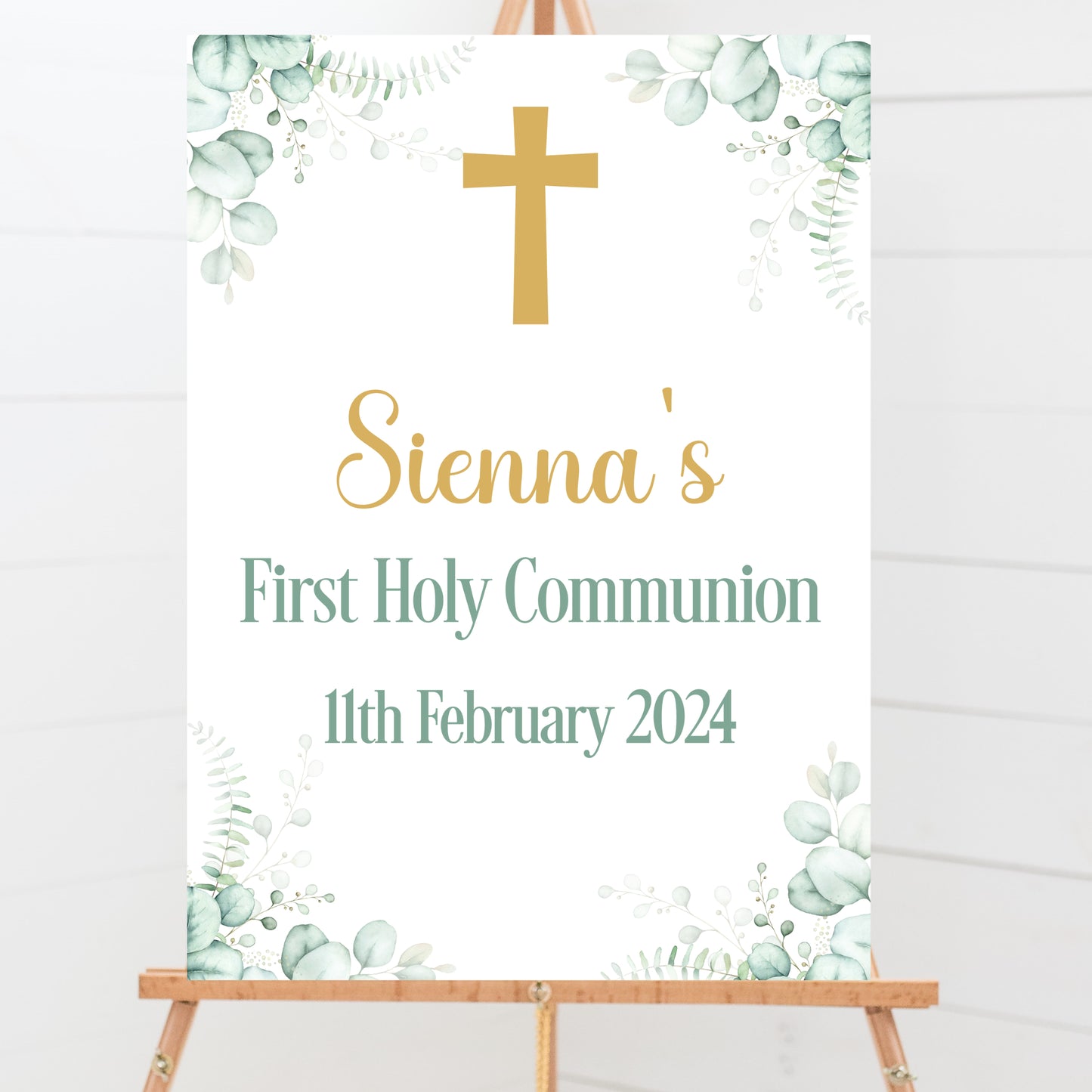 a white sign with a cross on it