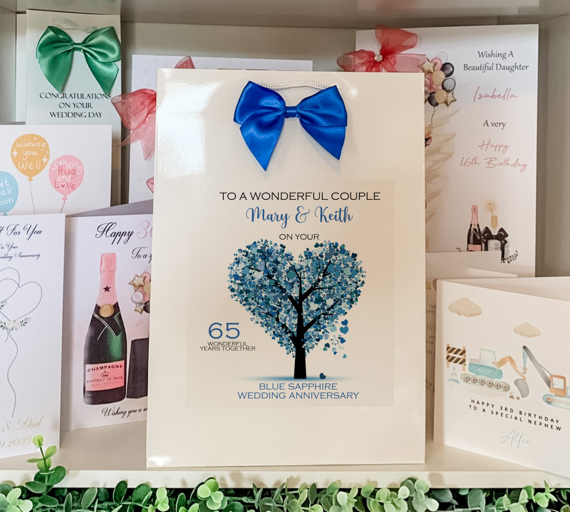 a couple of cards are on a shelf