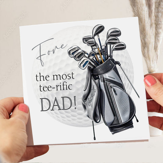 A greeting card with a golf bag and clubs, along with the text "Love the most tee-rific DAD!"