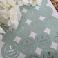 a bunch of stickers with a cross on them