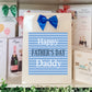 a father's day card with a blue bow on it