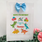 a picture of a birthday card with dinosaurs and balloons