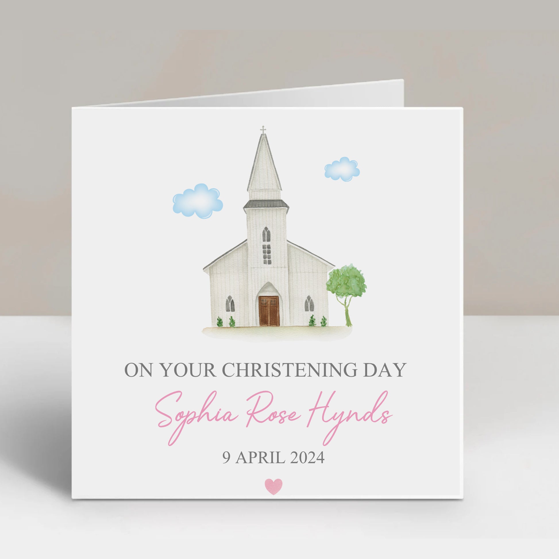 a white card with a church on it