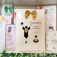 a card with a picture of a girl in a graduation outfit