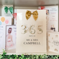 a couple of cards are on a shelf