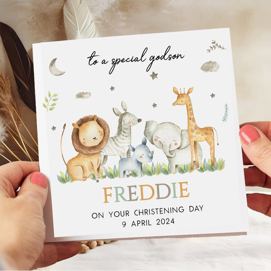 a person holding a card with animals on it