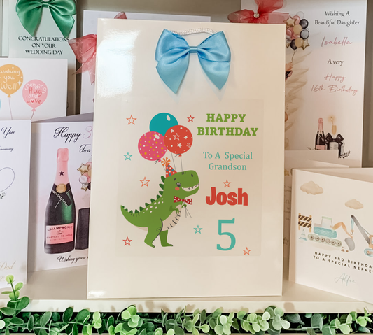 a birthday card with a dinosaur holding balloons