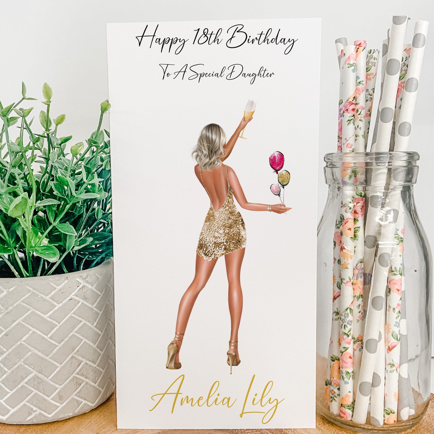 a birthday card with a picture of a woman holding a rose