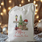 white drawstring personalised christmas eve treat bag for pjs, pyjamas, hot chocolate, treats and mug