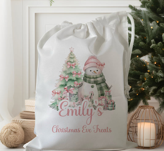 white drawstring personalised christmas eve treat bag for pjs, pyjamas, hot chocolate, treats and mug