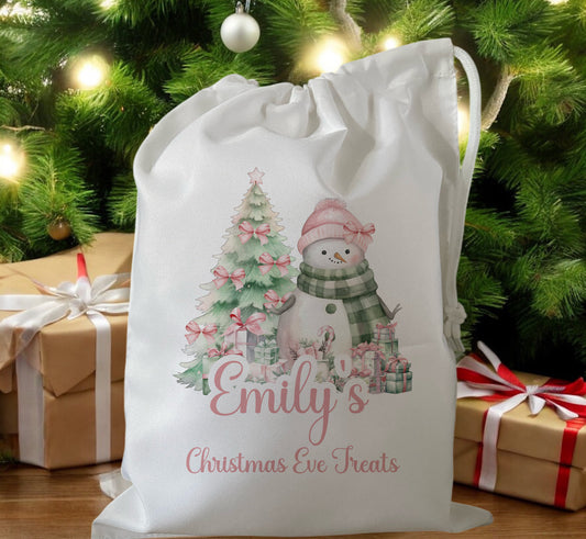 white drawstring personalised christmas eve treat bag for pjs, pyjamas, hot chocolate, treats and mug