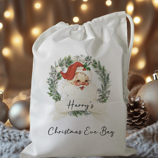 white drawstring personalised christmas eve treat bag for pjs, pyjamas, hot chocolate, treats and mug