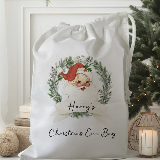 white drawstring personalised christmas eve treat bag for pjs, pyjamas, hot chocolate, treats and mug