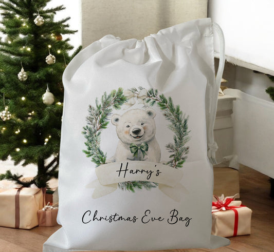 white drawstring personalised christmas eve treat bag for pjs, pyjamas, hot chocolate, treats and mug