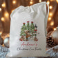 white drawstring personalised christmas eve treat bag for pjs, pyjamas, hot chocolate, treats and mug
