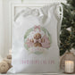 white drawstring personalised christmas eve treat bag for pjs, pyjamas, hot chocolate, treats and mug
