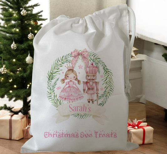 white drawstring personalised christmas eve treat bag for pjs, pyjamas, hot chocolate, treats and mug