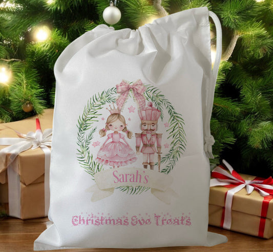 white drawstring personalised christmas eve treat bag for pjs, pyjamas, hot chocolate, treats and mug