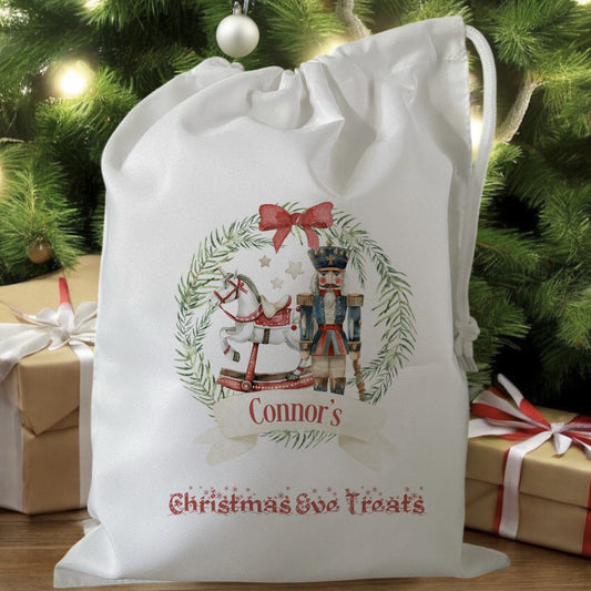white drawstring personalised christmas eve treat bag for pjs, pyjamas, hot chocolate, treats and mug