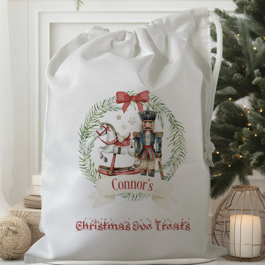 white drawstring personalised christmas eve treat bag for pjs, pyjamas, hot chocolate, treats and mug