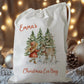 white drawstring personalised christmas eve treat bag for pjs, pyjamas, hot chocolate, treats and mug