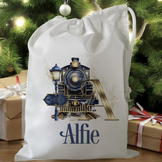 white drawstring personalised christmas eve treat bag for pjs, pyjamas, hot chocolate, treats and mug