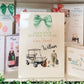 gift bag with a green bow, golf cart, and person walking with a bag, surrounded by other cards.