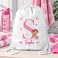 White personalised drawstring swimming bag for girls, featuring a fun pink swimmer design with a large initial and name. Perfect for swimming lessons, leisure swimming, holidays and keeping swimwear and essentials together.