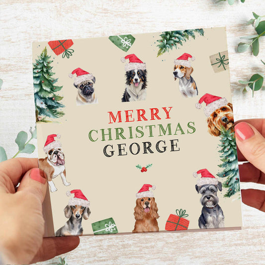 christmas card with cream background and lots of dogs breeds