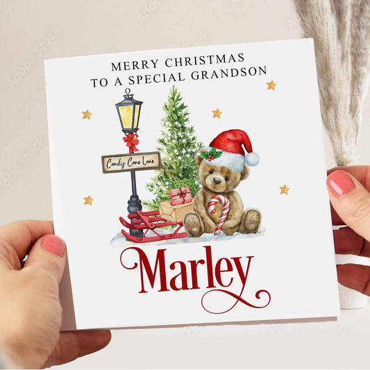 christmas card for boy with teddy bear design and sleigh with gifts and christmas tree.  Printed onto 300gsm cardstock and comes.
