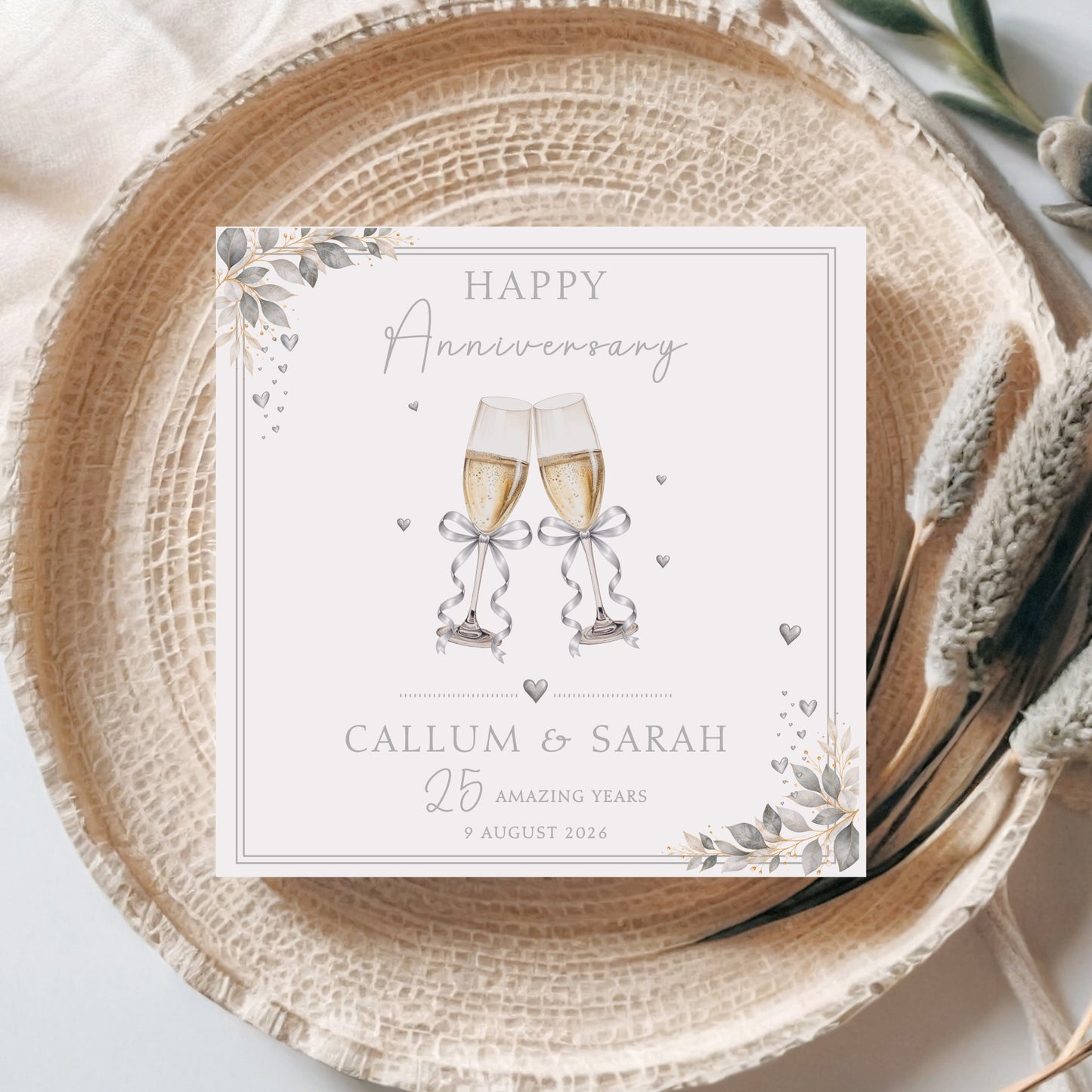Personalised 25th Wedding Anniversary Card with champagne glasses, silver bows, hearts and elegant foliage for a Silver Wedding Anniversary