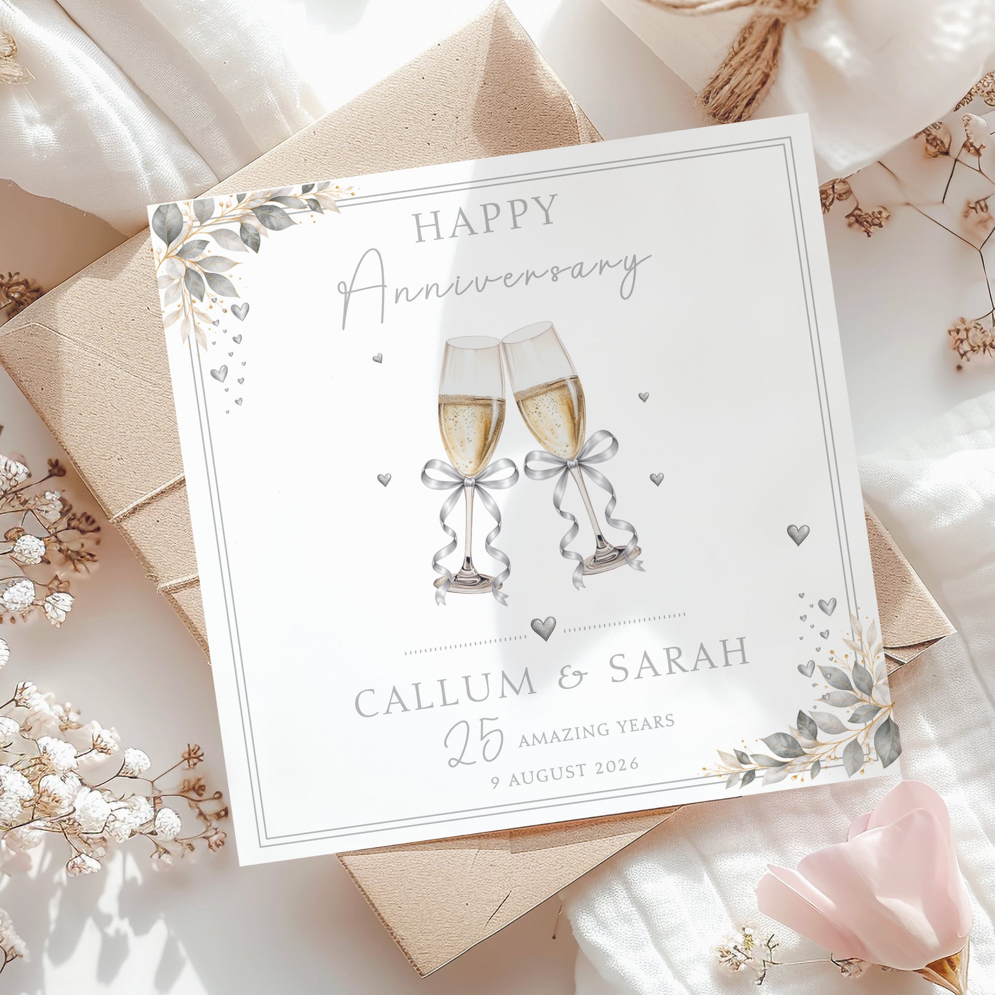 Personalised 25th Wedding Anniversary Card with champagne glasses, silver bows, hearts and elegant foliage for a Silver Wedding Anniversary