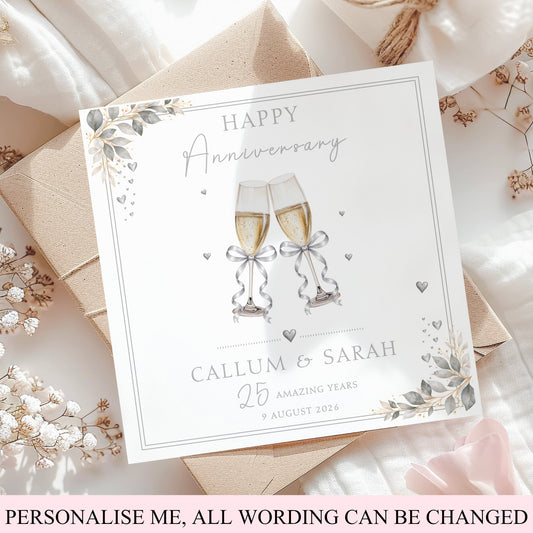 Personalised 25th Wedding Anniversary Card with champagne glasses, silver bows, hearts and elegant foliage for a Silver Wedding Anniversary