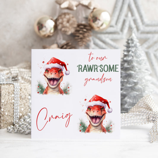 christmas card for boys with 2 dinosaurs on the front