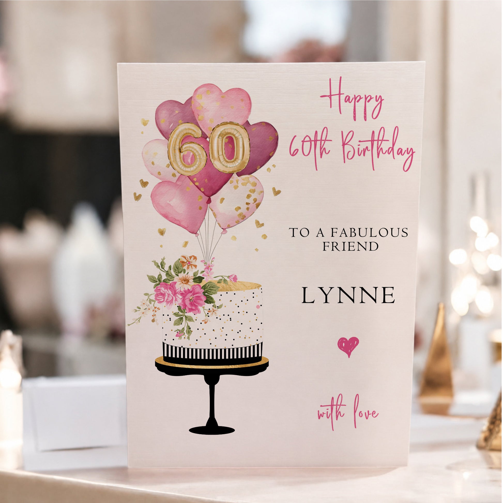 Personalised large A4 luxury 60th birthday card featuring a floral birthday cake, pink and gold heart balloons, gold number balloons, customised with any name and hand-finished with gorgeous sparkle.